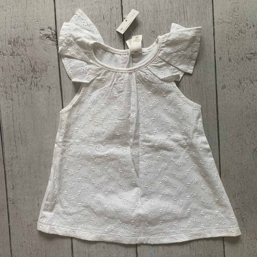 White sleeveless summer top for toddler girls